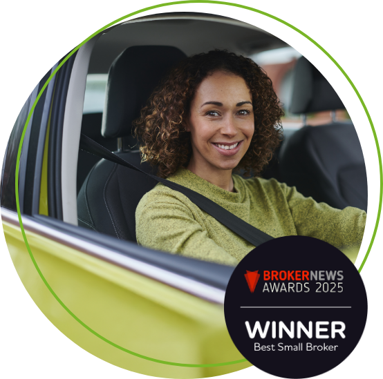 Woman in car smiling